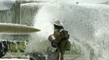 Man washing plane