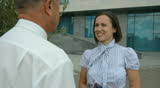 conversation of two businesspeople on street