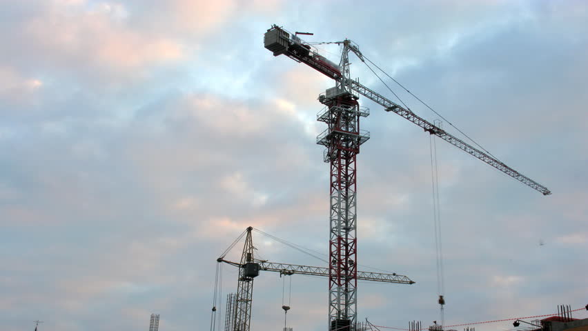 crane and sky construction time lapse. City at a dawn.