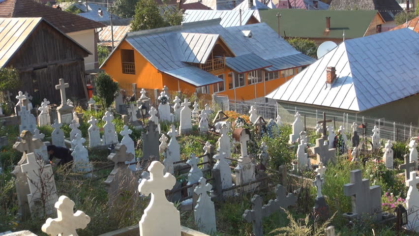 Widows Lighting a Candle to The Deceased, Orthodox Cemetery, Cross