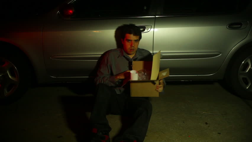 unemployed man with a box
