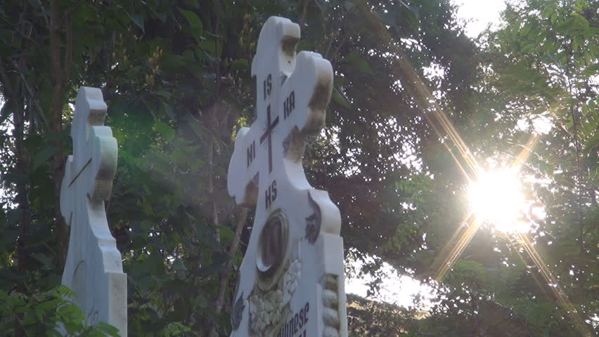 Sunshine Near a Cross in a Graveyard, Orthodox Cemetery