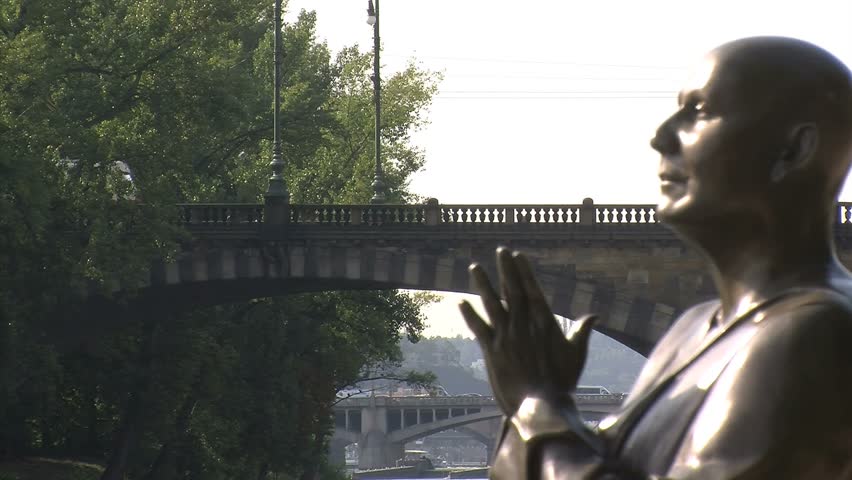 Prague, Czech Republic - July 2012: The statue of Harmony sits along the river's edge