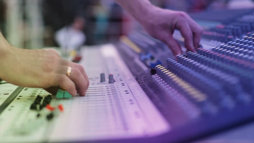 Sound designer working on the sound control
