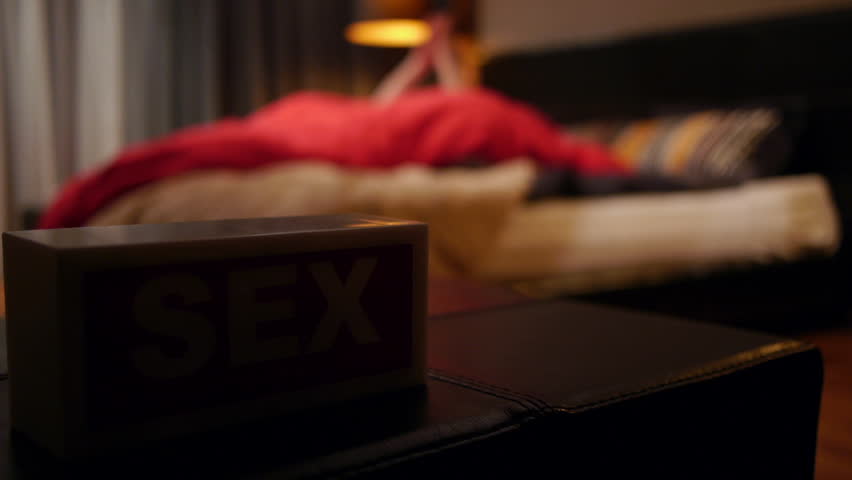 sex in progress. neon sign concept with selective focus. 