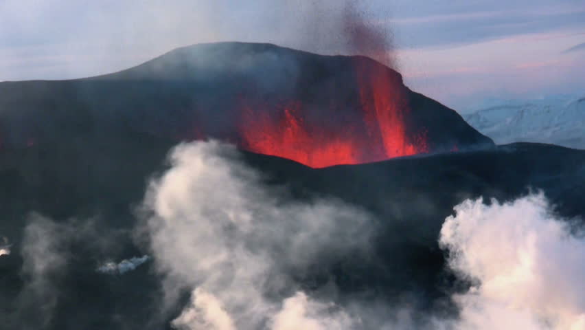 Volcanic Eruption in Iceland  2010 in Eyjafjallajokull. Footage taken in extreme conditions only a half mile from the crater during frequent gas explosions from advancing lava. A mountain is born.