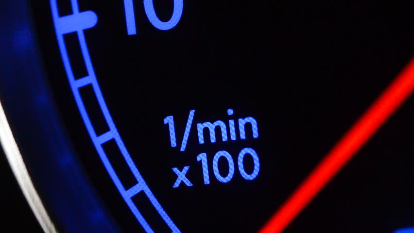 Engine start, tachometer dashboard close up