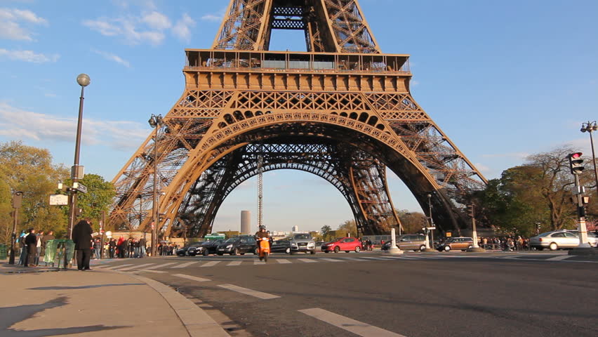 PARIS, FRANCE â APRIL 8: Traffic at base of the Eiffel tower on April 8th, 2012. The Eiffel tower is the most visited paid monument in the world.
