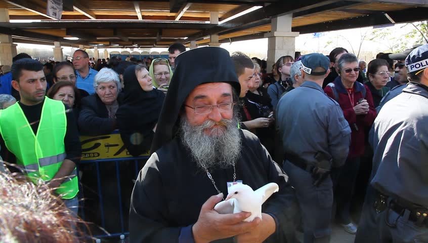 QASR AL YAHUD, ISRAEL â JANUARY 18: Greek Orthodox pilgrims wait for baptism during the Epiphany at Qasr Al Yahud, Israel, January 18 2012