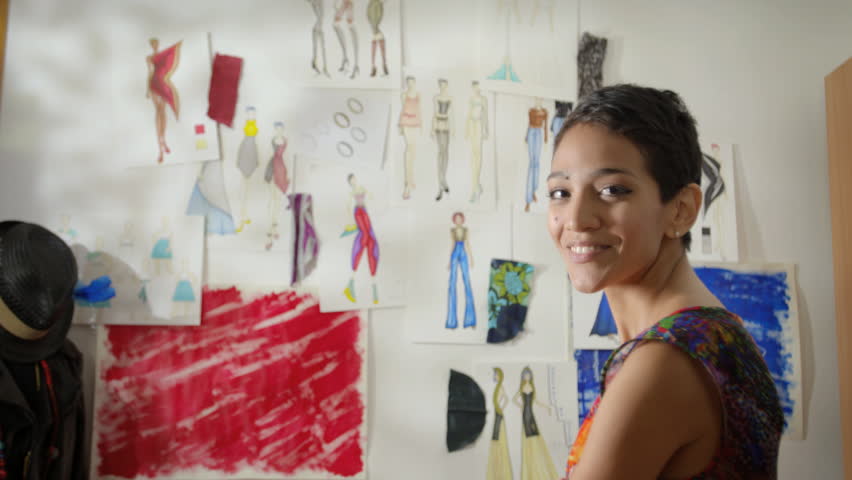 Confident entrepreneur, portrait of happy hispanic young woman working as fashion designer and dressmaker in atelier
