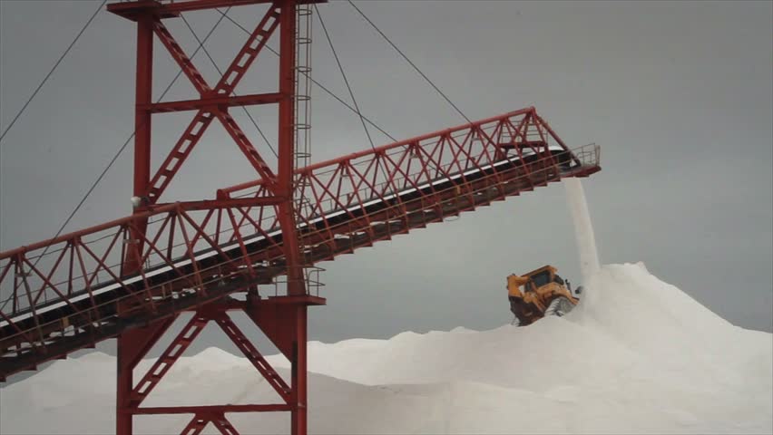 Crane and Mountain of Salt with Bulldozer working