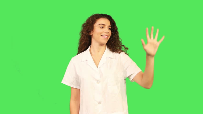 Female scientist making hand gesture
