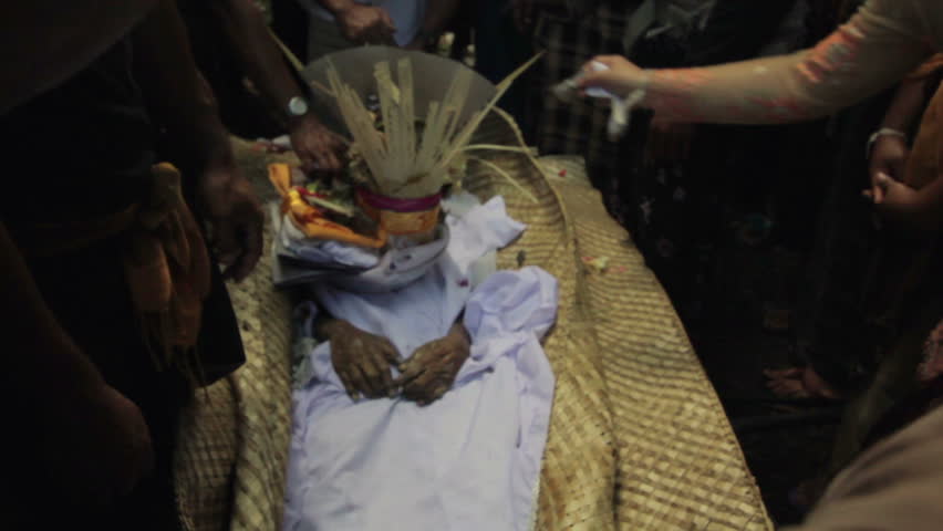 burning dead body in Balinese funeral, Bali, Indonesia