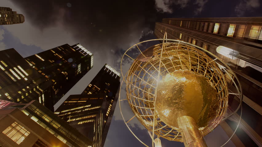 NEW YORK, NY - CIRCA 2012: Time lapse of Kim Brandell's Steel Globe sculpture at Columbus Circle at sunset circa 2012 in New York, NY.