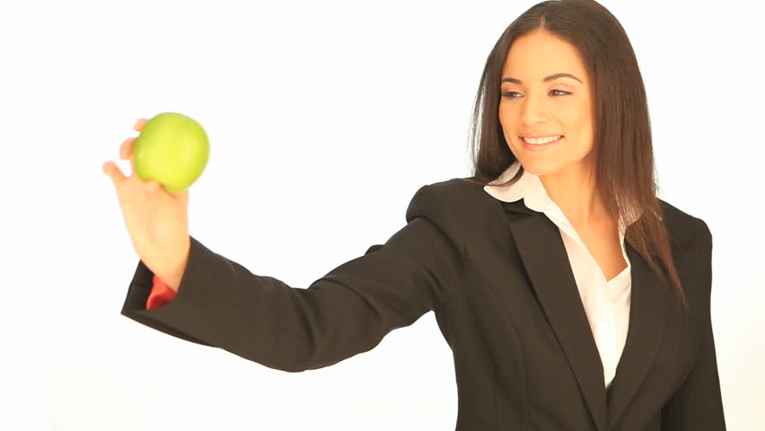Attractive businesswoman with an apple
