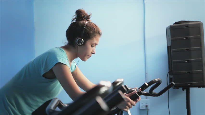 Woman taking a spinning class