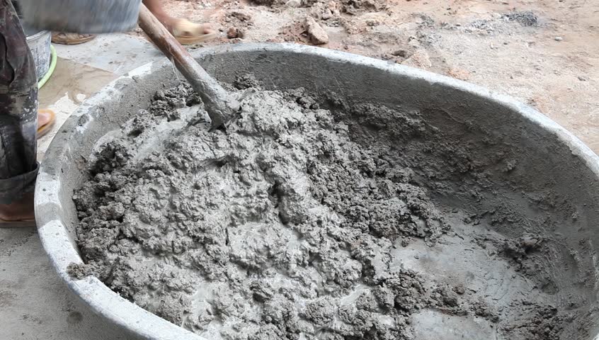 Mixing Cement For The Preparation Of Construction . Stock Footage Video