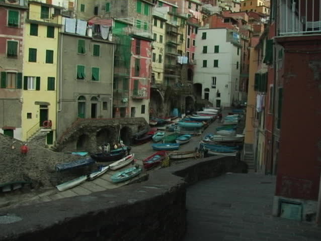 Beautiful Italian Riviera town of Riomaggiore. Tilt up.