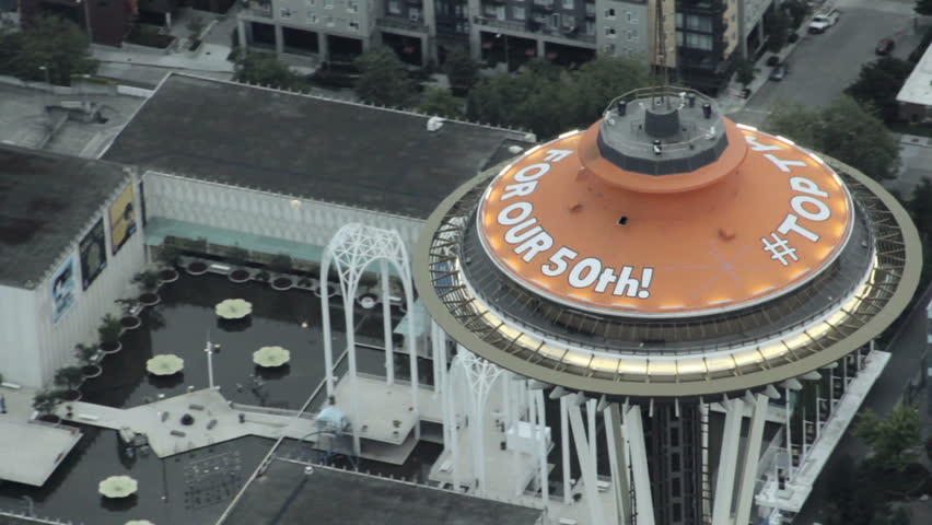 SEATTLE - CIRCA 2012: The Space Needle advertises a contest using the #TOPTHIS Twitter hashtag circa 2012 in Seattle, WA. Artists are invited to submit designs to be displayed on top of the Space Needle for its 50th anniversary.