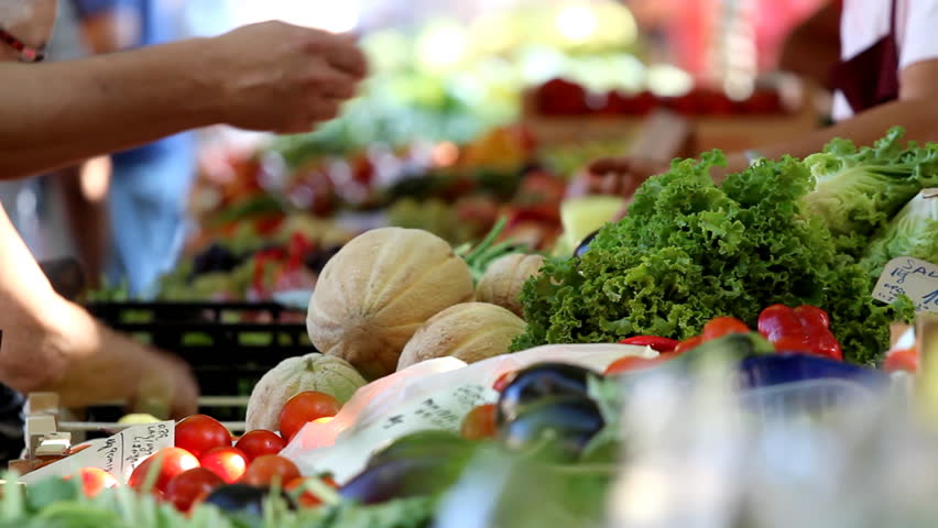 PULA-SEPTEMBER 2: People buying and selling fruit and vegetables on the greenmarket, September 2, 2011 in Pula, Croatia.
