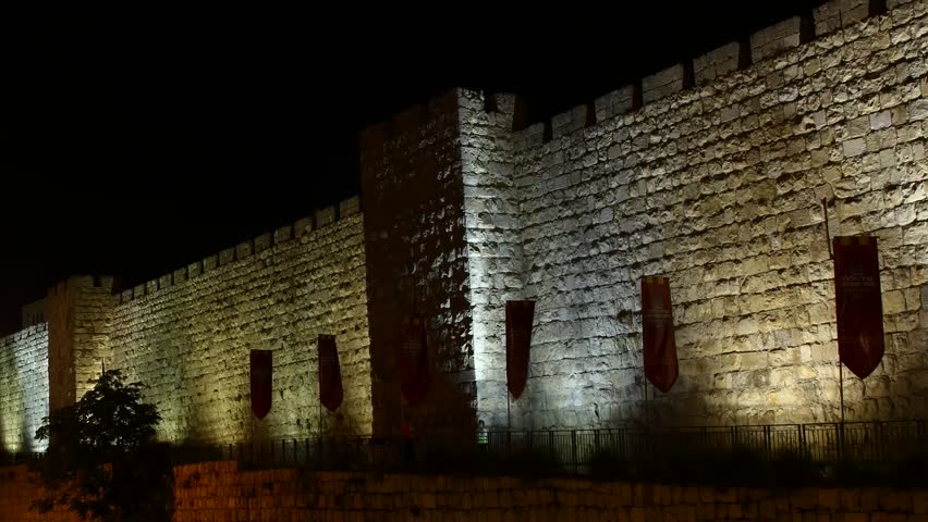 JERUSALEM, ISRAEL - NOVEMBER 01: Tourists hurry to their destinations near the wall of Jerusalem, time lapse view, Israel, 01 November 2012