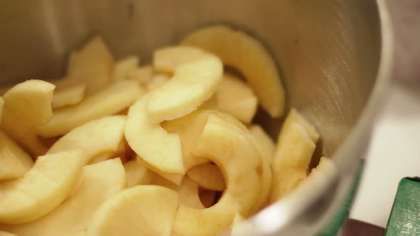 Sliced Apples Drop into Bowl