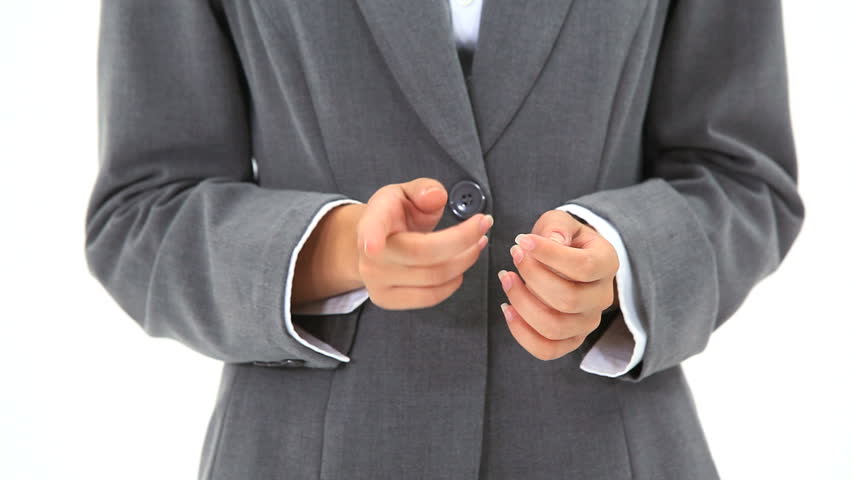 Hands being crossed against a white background