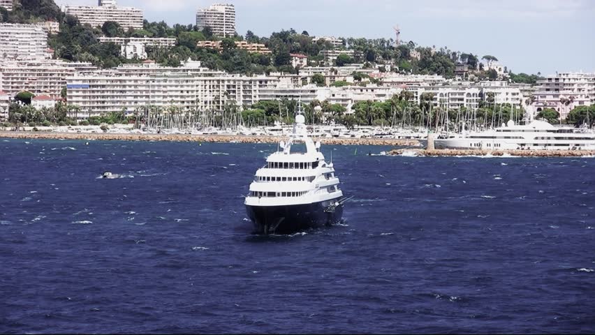Luxury private yacht anchored in Cannes bay; France.