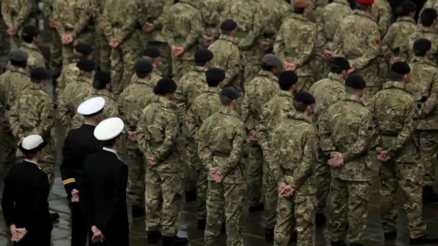 PRESTON, UK - NOVEMBER 11: Armed forces and service personnel commemorating the Remembrance Day service at the Cenotaph, Preston, UK on the 11th November 2012