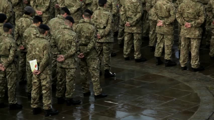 PRESTON, UK - NOVEMBER 11: Armed forces and service personnel commemorating the Remembrance Day service at the Cenotaph, Preston, UK on the 11th November 2012