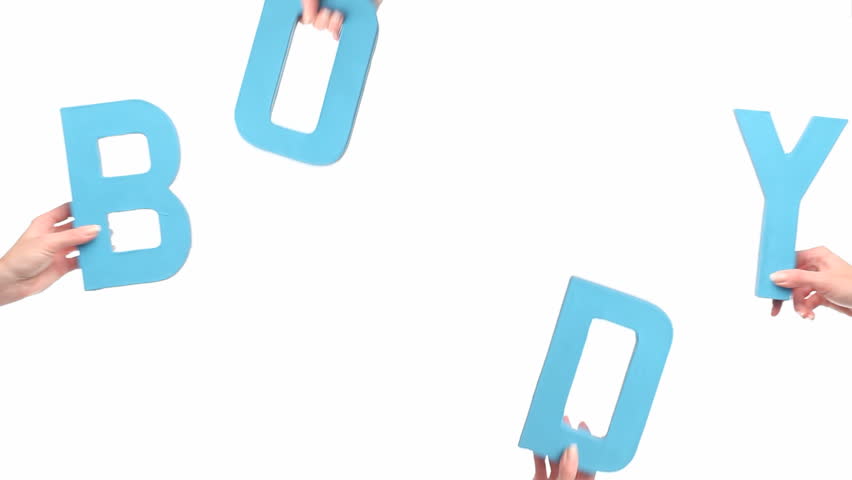 Female hands holding letters BODY
