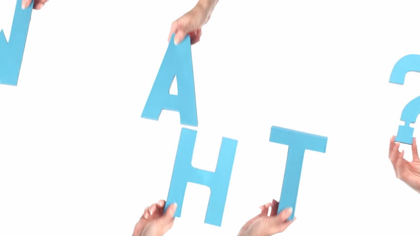Female hands holding letters WHAT?