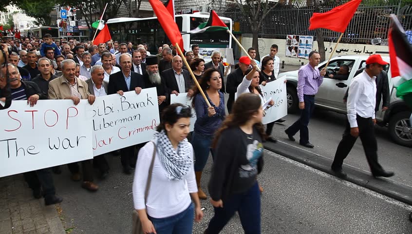 NAZARETH, ISRAEL - NOVEMBER 17: Arab Muslim Knesset Members lead march of Israelis in anti war demonstration supporting Gaza in Nazareth Israel, 17 November 2012