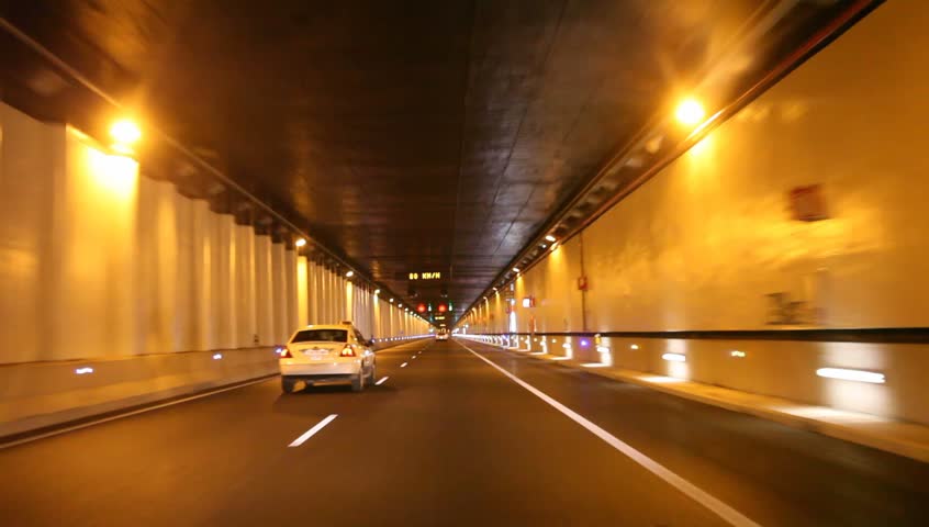 Driving through a highway tunnel