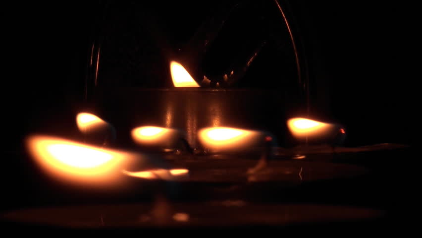 Beautiful candle lights in pitch black night 