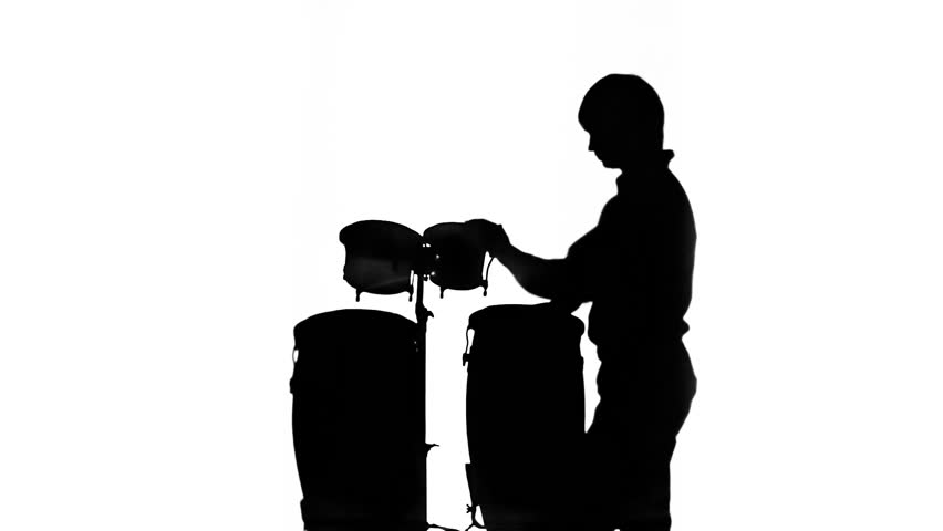 A man plays the drums. Silhouette. Black and white. Isolated on white.
