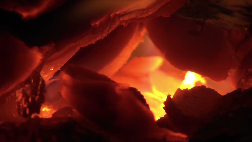 Fire with ember burning in furnace slow motion
