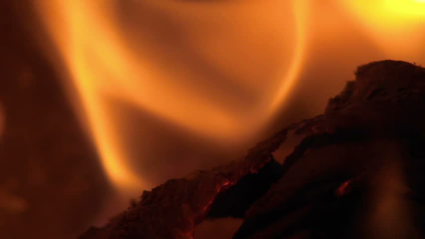 Fire with ember burning in furnace slow motion
