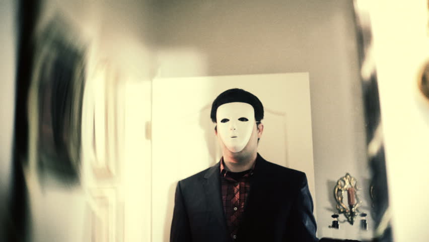 creepy serial killer in a mask