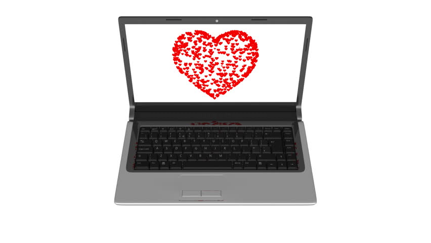 Online Dating Heart - Red heart forms on a laptop screen.