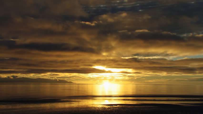 Long Sunset Clouds over Bay with Ship and People Low Tide