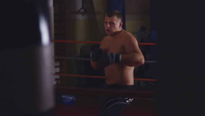 Two men sparring on ring