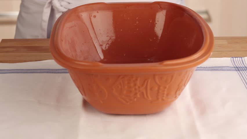 A damp terracotta baking dish