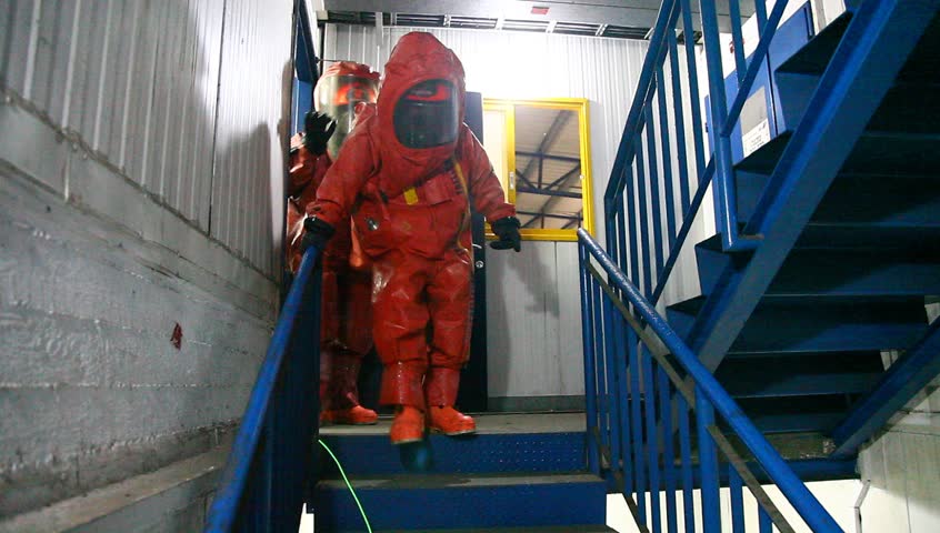 NORTHERN ISRAEL -DECEMBER 17: Firefighters practice to remedy leak accident of corrosive toxic hazardous material Ammonia liquid in seven food factories using protective suites, Northern Israel December 17 2012