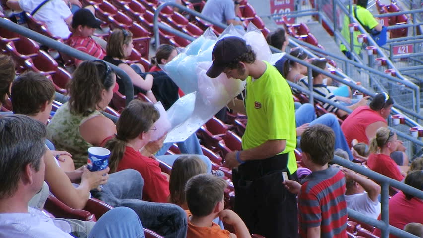 CINCINNATI - SEPTEMBER 2: Food vendor (name withheld) from Cincinnati, OH selling cotton candy during a Cincinnati Reds baseball game September 2, 2008 in Cincinnati, Ohio.
