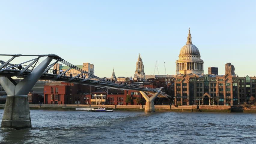 St Paul's Cathedral and Millennium Bridge sunset time-lapse wide. Stunning time lapse of St Paul's Cathedral with exposure adjusting as the sun sets.