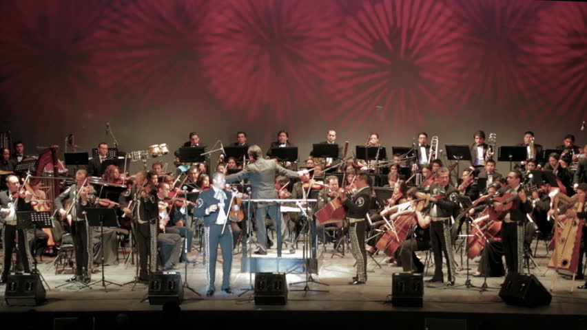MEXICO, GUANAJUATO - CIRCA OCTOBER 2012 : Playing in concert mexican marichi and symphonic orchestra in Festival Cervantino