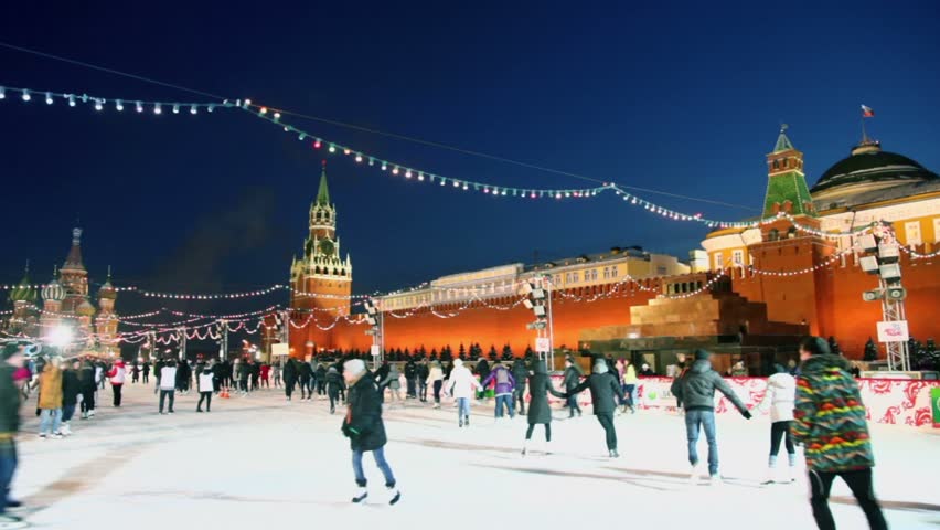 MOSCOW - JAN 25: Many people ride on skates at GUM skating-rink on Red square near kremlin wall during Tatyanas day holiday on Jan 25, 2012, Moscow, Russia. GUM Rink Capacity is 450 people