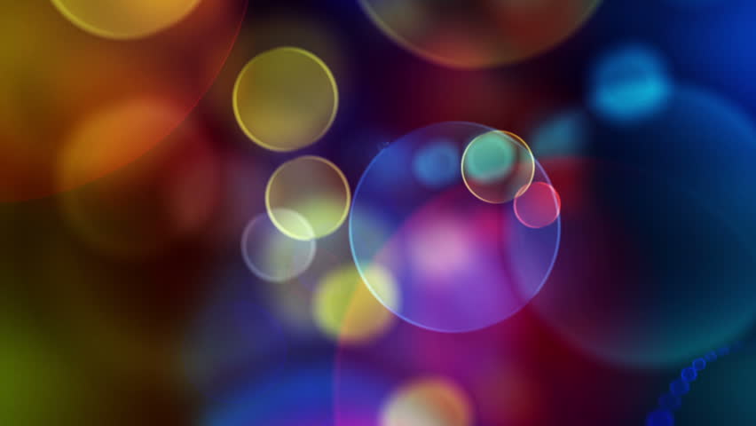 Colorful Circles Video Background Loop  ///  Glassy circular shapes perform a colorful dance. motion background that is just perfectly suited for DVDs, events, clubs and lounges. 