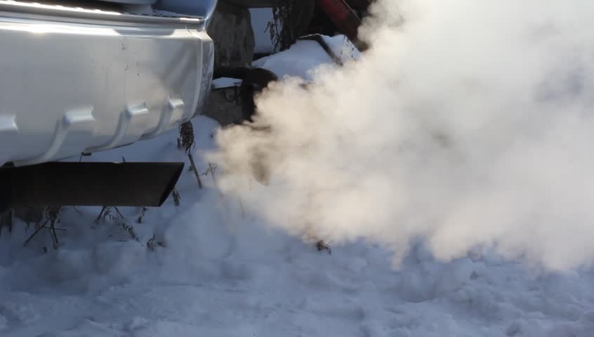 Exhaust gases from the muffler running car.